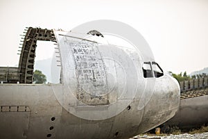 crash-landed aircraft. airplane wreckage in jungle - old propeller aircraft in forest.