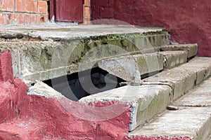 Crash of stone steps. The stairs are old and crumbling. The wall