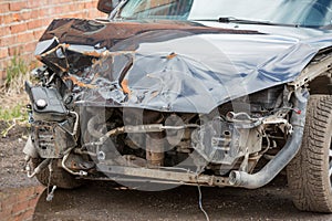 Crashed car front side close up