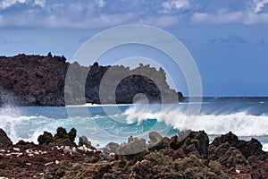 Crashing surf at the rocky shore at La Perouse Bay on Maui.