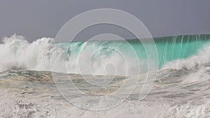 Crashing wave huge cloe out barrel North shore photo