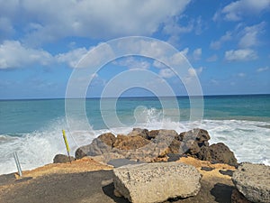 Crashing waves on the pier of Aguada Puerto Rico photo