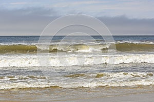 Crashing Waves on a Remote Beach photo