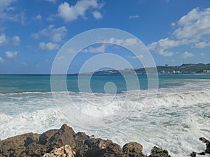 Crashing waves on the rocky Shore of Aguada Puerto Rico photo