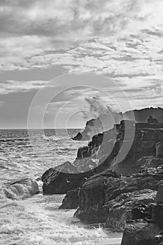 Crashing waves on rocky shore - BnW