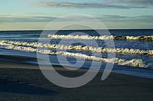 Crashing waves at sunrise gulf of mexico