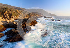 Crashing Waves at Sunset on Big Sur coast, Garapata State Park, near Monterey, California, USA photo