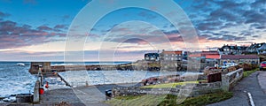 Craster Harbour and Village Panorama photo