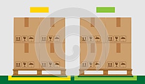 Crate boxes on wooded pallet and green marking area for products arrangement concept, stack cardboard box in factory warehouse