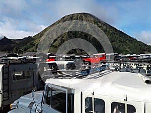 The crater area of Mount Bromo is filled with jeeps