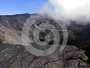 Crater Dolomieu, piton de la fournaise, halfway covered by cloud
