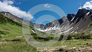 The crater of an extinct volcano. Snowmelt on steep slopes.