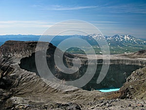 Crater lake in Gorely volcano, Kamchatka peninsula, Russia photo