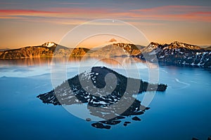 Crater Lake and Moon in vibrant sunset colors