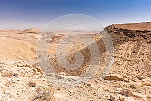 Crater mountains stone desert landscape Middle East nature scenic.