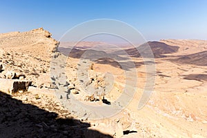 Crater mountains stone desert landscape Middle East nature scenic.