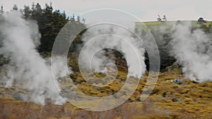 Craters of The Moon Geysers Park, New Zealand. Steam from geothermal valley. Slow motion