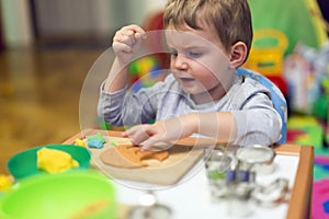 Crative boy in his workshop