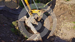 Crawler excavator digging on dirt. Excavating machine. Earth moving machine. Excavation vehicle.