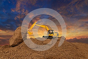 Crawler excavator is digging soil in the construction site