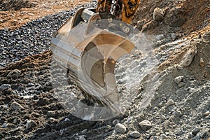 Crawler excavator digging on soil, excavating machine