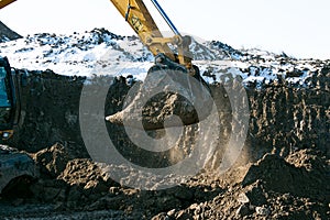 Crawler excavator. Earth-moving machine at a construction site.