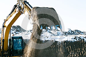 Crawler excavator. Earth-moving machine at a construction site.