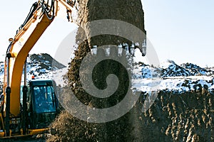 Crawler excavator. Earth-moving machine at a construction site.