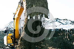 Crawler excavator. Earth-moving machine at a construction site.