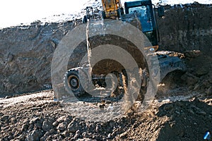 Crawler excavator. Earth-moving machine at a construction site.