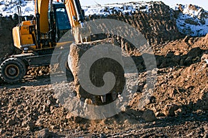 Crawler excavator. Earth-moving machine at a construction site.