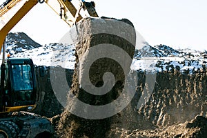 Crawler excavator. Earth-moving machine at a construction site.