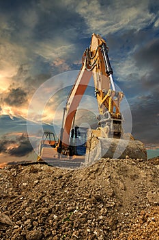 Crawler excavator during earthmoving works on construction site