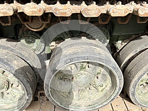 A crawler mechanism in a tank or bulldozer