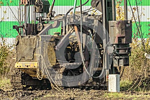 Crawler mobile diesel pile hammer working on construction site