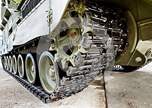 Crawler tracks of military tank photo