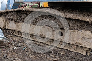 Crawler wheel crane full of mud