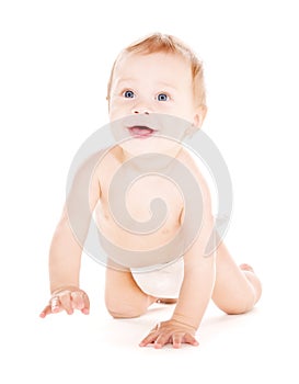 Crawling baby boy in diaper