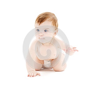 Crawling baby boy in diaper