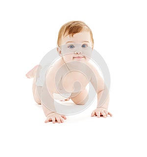 Crawling baby boy in diaper