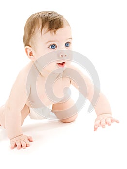 Crawling baby boy in diaper