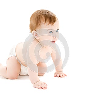 Crawling baby boy in diaper