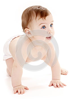 Crawling baby boy looking up