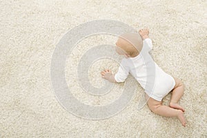 Crawling Baby on Carpet Background, Infant Kid Top View, Newborn