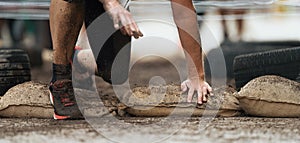 Crawling passing under a barbed wire obstacles