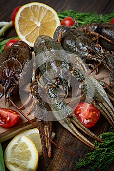 Crayfish. Fresh crayfish on a table in a rustic style, close-up. Lobster closeup