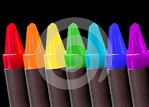 Crayons over black