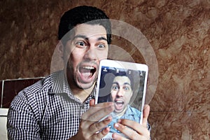 Crazy arab egyptian businessman taking selfie