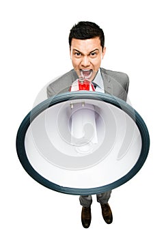 Crazy Asian businessman screaming in megaphone on white background