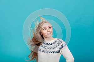 Crazy blonde woman with windblown blonde hair